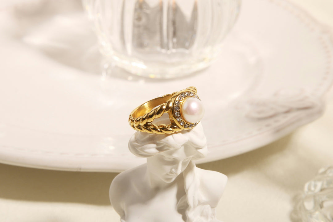 Pearl birthstone ring on a beautiful white tablescape