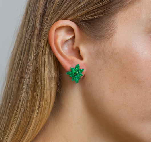 Side profile of blonde woman wearing 18k White Gold, Green Rhodium Emerald Folha Earrings