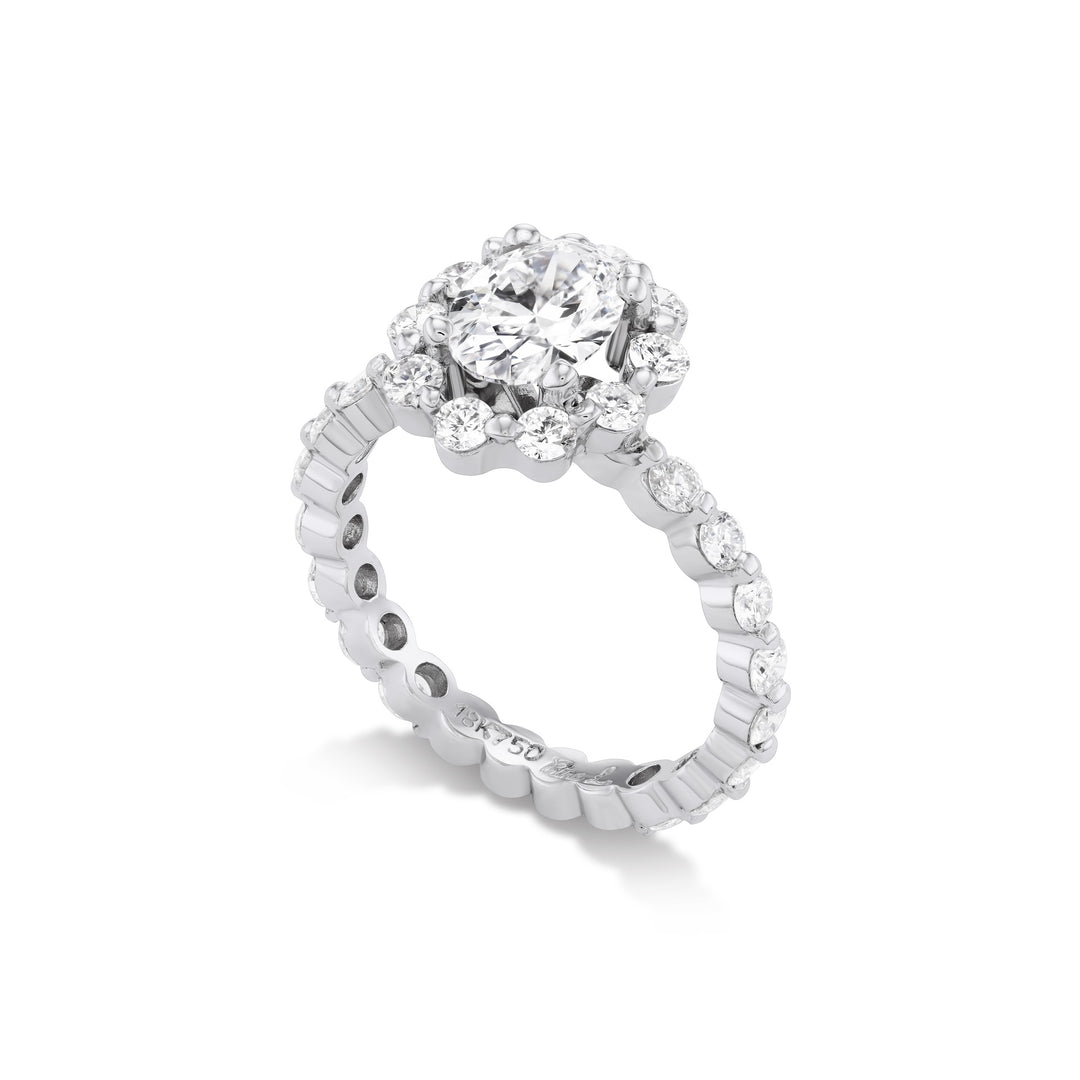 18K White Gold , Oval LG Diamond center stone ring  with Round Brilliant Cut Diamond Setting and Oval Halo.  Size 6.25