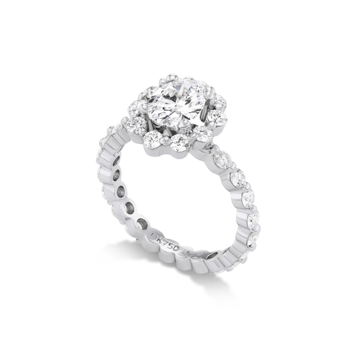 18K White Gold , Oval LG Diamond center stone ring  with Round Brilliant Cut Diamond Setting and Oval Halo.  Size 6.25