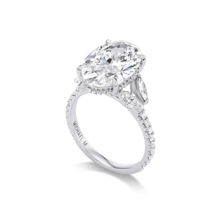 18K White Gold Icon Bridal Ring with 5.0 carat LG Oval Shaped Diamond and  Round & Marquise Natural Diamonds on the Band and Hidden Halo.