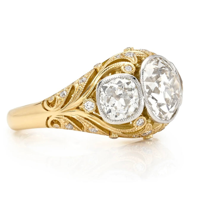 18K Yellow Gold and Platinum "Agnes" Three Stone Ring featuring a 2.73 ct Old Mine Cut Diamond Center