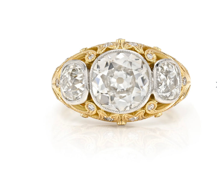 18K Yellow Gold and Platinum "Agnes" Three Stone Ring featuring a 2.73 ct Old Mine Cut Diamond Center