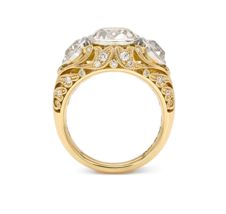 18K Yellow Gold and Platinum "Agnes" Three Stone Ring featuring a 2.73 ct Old Mine Cut Diamond Center