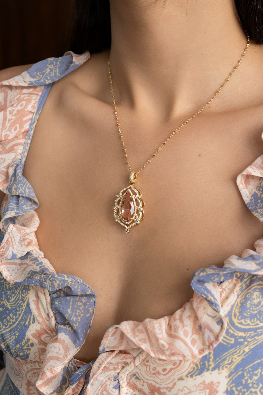 18K Yellow Gold, Morganite(19.07ct) Pear Pendant with Diamond Accents on Diamond Bail (1.12cttw).