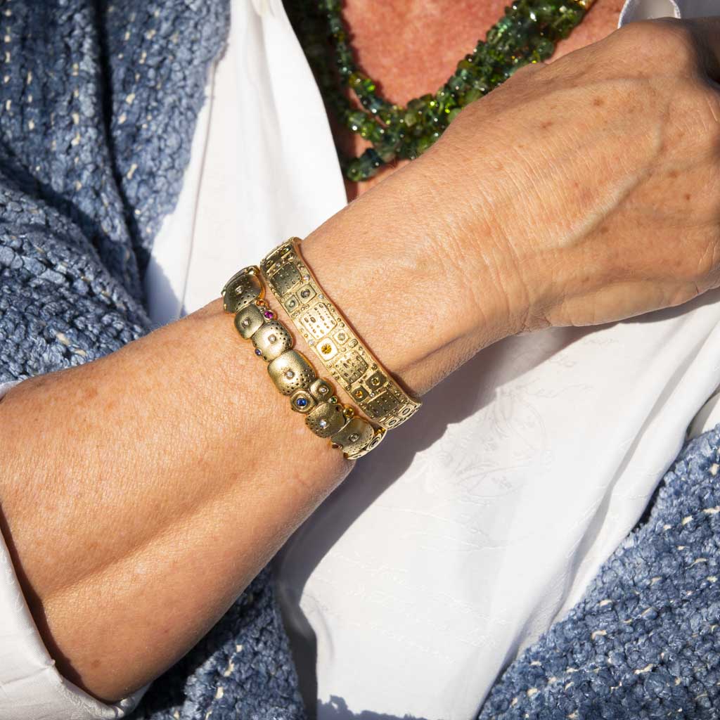 18K Yellow Gold,  Sapphire, Ruby, Tsavorite & Diamond "Little Orchard" Cuff Bracelet Model Close Up