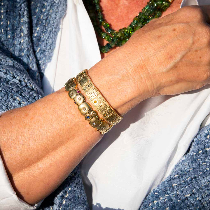 18K Yellow Gold,  Sapphire, Ruby, Tsavorite & Diamond "Little Orchard" Cuff Bracelet Model Close Up