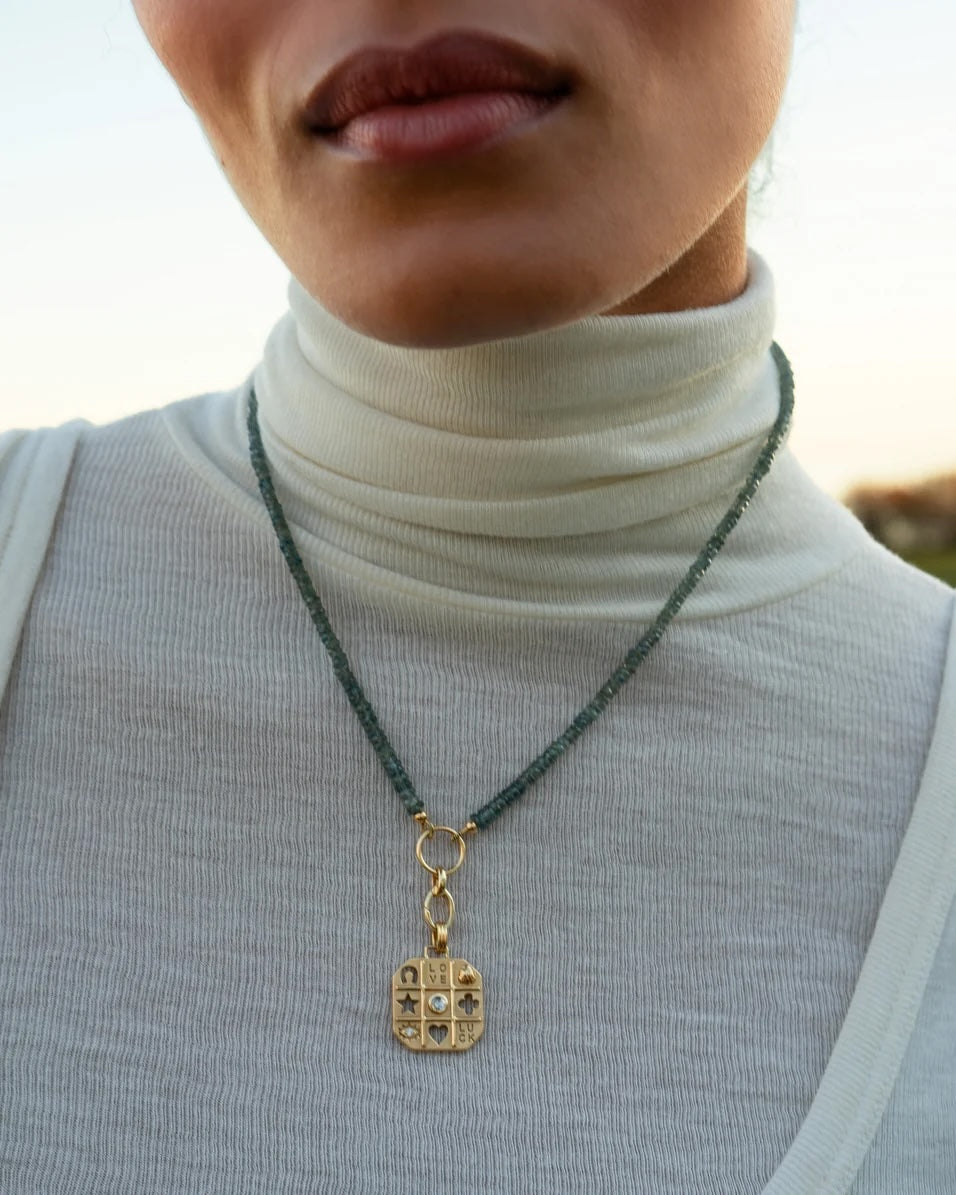 18K Yellow Gold & Green Sapphire Necklace with "Tokens of Luck" Charm and Diamond.