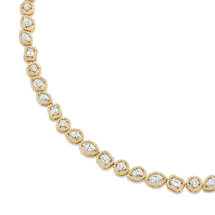 18K Yellow Gold Montage Halo Riviera Necklace with Round, Marquise, Emerald, and Pear Shaped Diamonds framed by a pave-set halo of round brilliant cut diamonds set half-way and open links on the other half (6.21cttw) F-G, VS