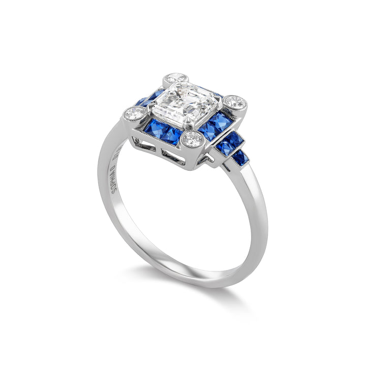 Platinum Ring with Asscher Cut Diamond,  Sapphires & Round Brilliant Cut Diamonds