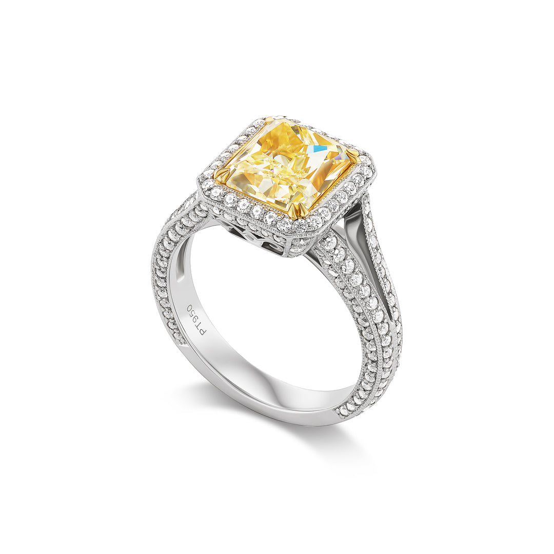 Platinum Ring with 3.04ct Radiant Yellow Diamond set with Round White Diamonds
