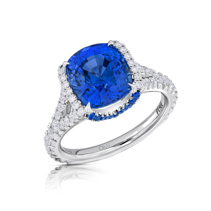 Platinum "Dorê"  Ring with 5.58 carat Cushion Sapphire Center, Sapphire and Diamond Accents