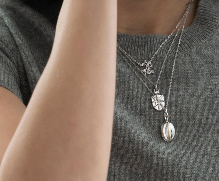 Sterling Silver "Fearless" Locket with White Sapphires (0.25 cttw) on a Steel Chain.