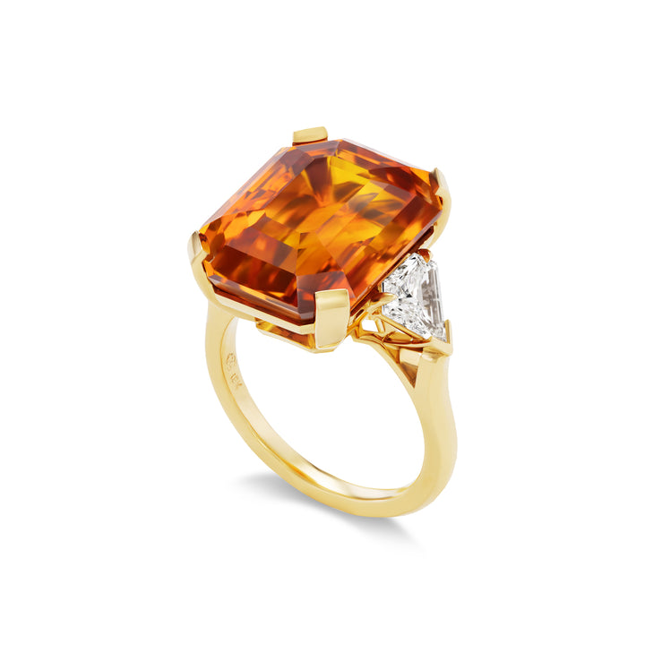 18K Yellow Gold Emerald-Cut Orange Sapphire Ring with two Shield-Cut Diamonds