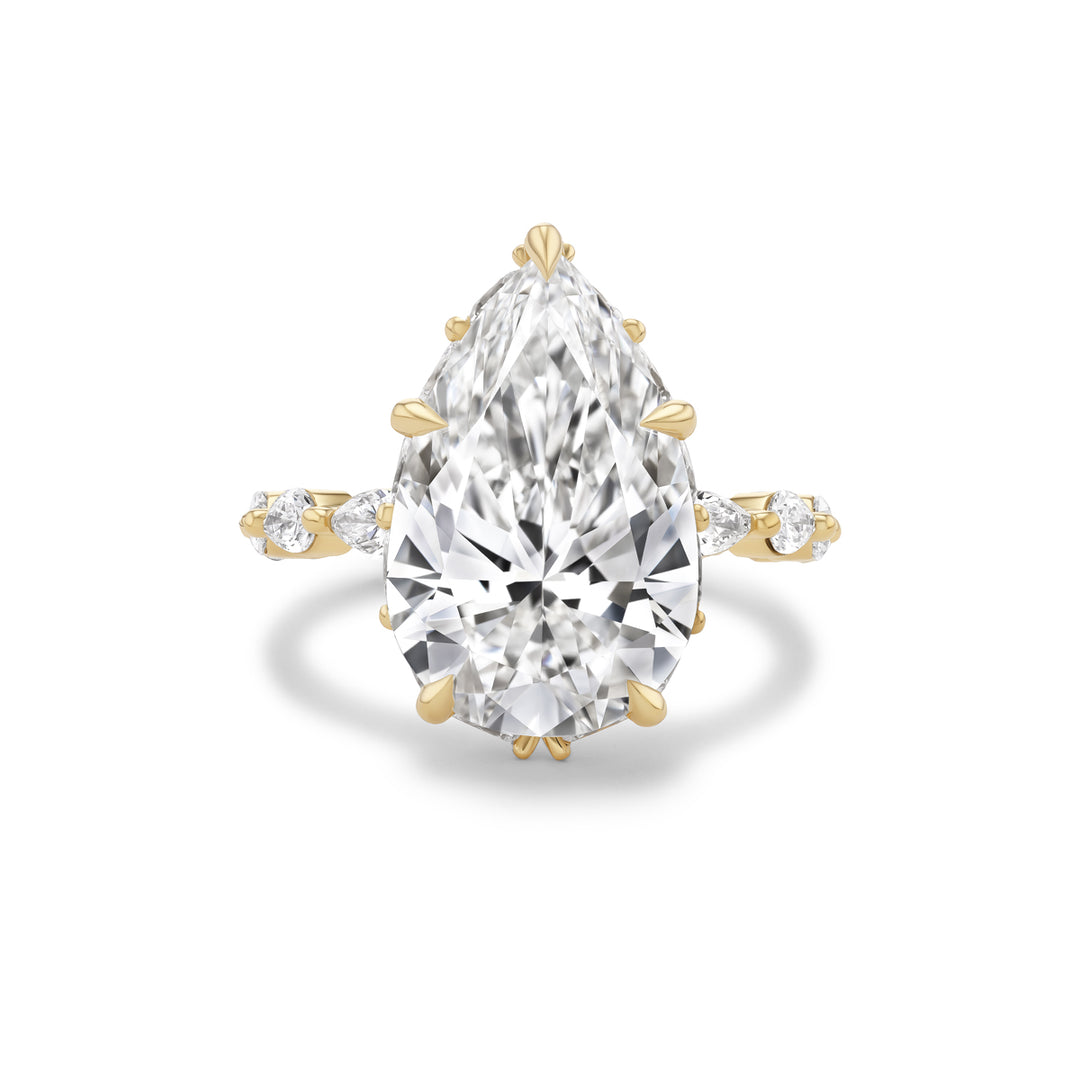 18K Yellow Gold Icon Bridal Ring with 8.07 ct LG Pear Shaped Diamond with Pear-Shaped Diamonds on Band.
