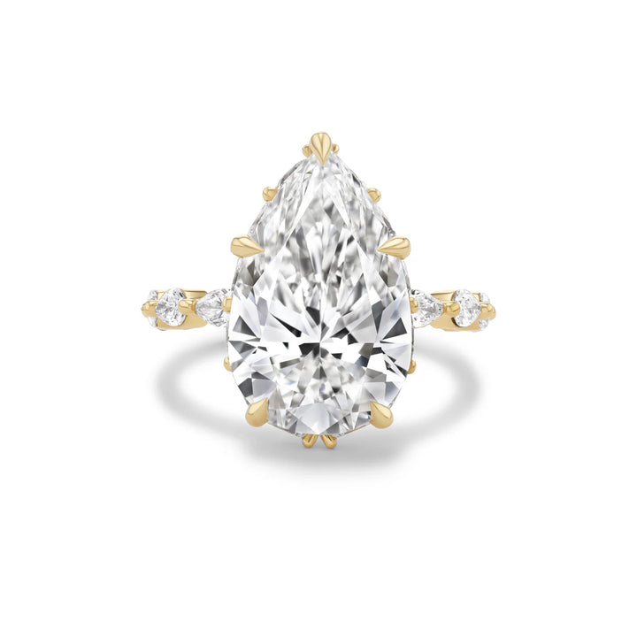 18K Yellow Gold Icon Bridal Ring with 8.07 ct LG Pear Shaped Diamond with Pear-Shaped Diamonds on Band.