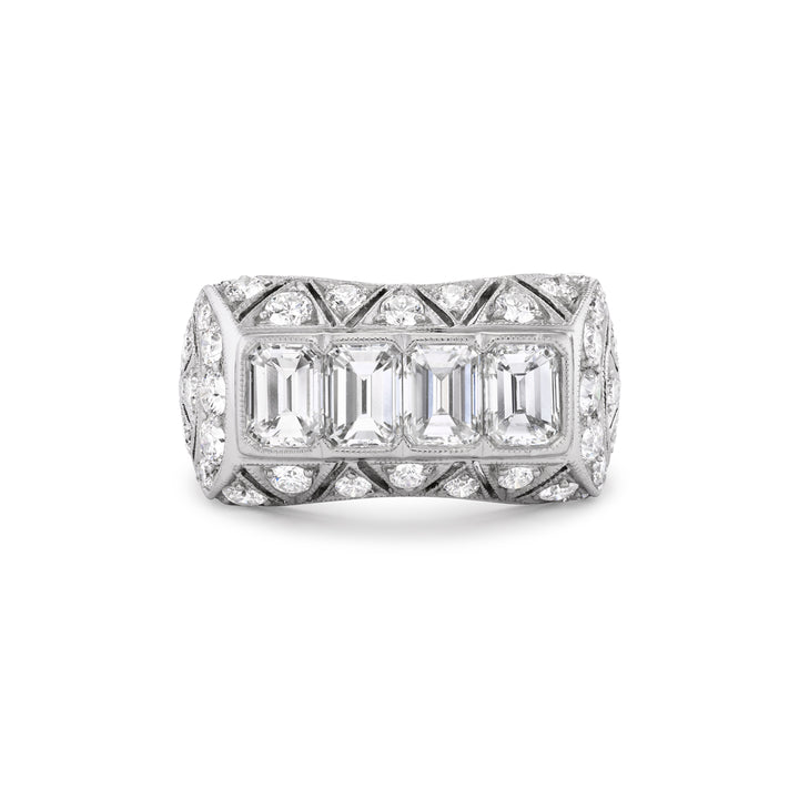 Platinum Vintage Style Ring with Emerald Cut and Round Diamonds